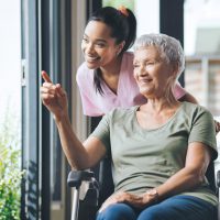 i-remember-it-like-it-was-yesterday-shot-young-nurse-standing-beside-older-woman-wheelchair